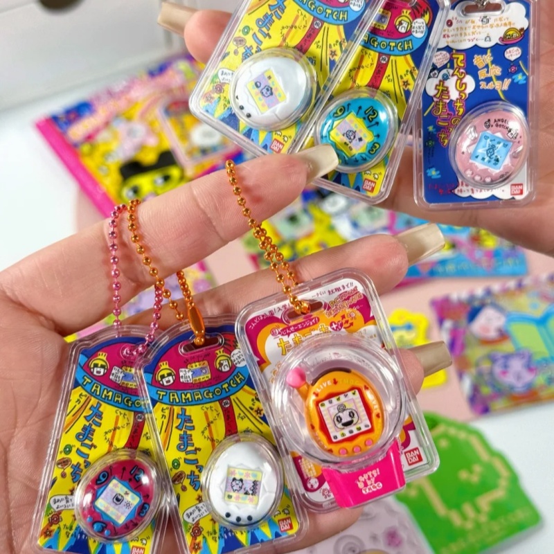 Bandai Tamagotchi Electronic P - đánh giá và giá Phone Accessories Doll